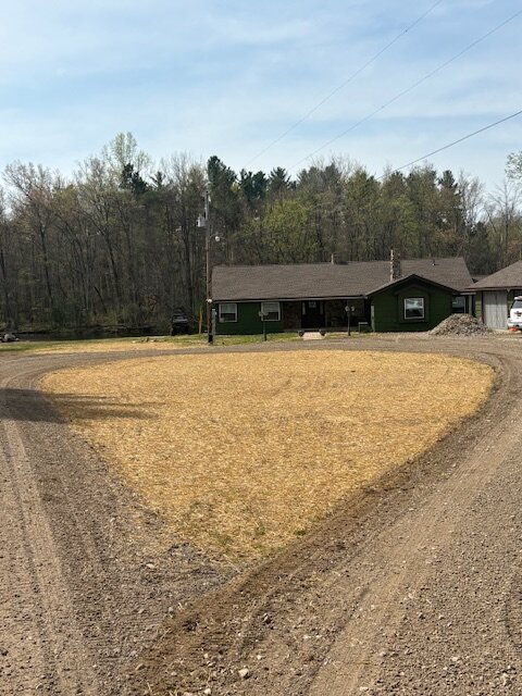 New gravel driveway approach to farmhouse